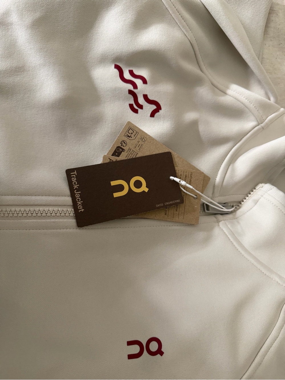 On Running Women's Cream Zip-Up Bomber Jacket with Maroon Logos - Picture 4 of 5
